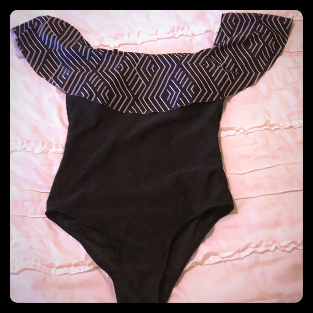 One piece ruffle top swim suit size M